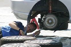 Mechanic fixing a car